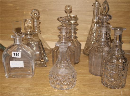 A collection of cut glass decanters